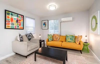 a living room with two couches and a coffee table at 2 Bedroom Home Near Downtown Zoo Golf Pet-Friendly and Fenced in Sacramento