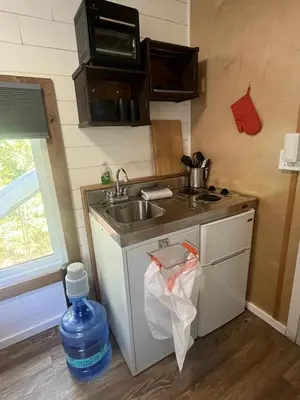 a small kitchen with a sink and a sink at Tiny one house at Yosemite Gateway in Groveland