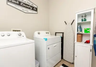 a laundry room with a washer and dryer at New Modern 3bed in North Merced 5 Star hosts in Merced
