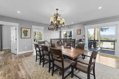 a dining room with a table and chairs at Lakeview Luxury Retreat with Hot Tub and Game Room in Carnelian Bay