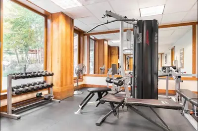 a fitness room with a gym with tread machines at Juniper Springs Lodge 437 in Mammoth Lakes
