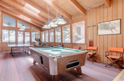 a large room with a pool table in it at Mammoth Estates 138 in Mammoth Lakes