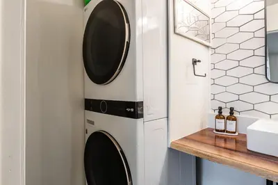 a laundry room with a washer and dryer at San Sierra 19 in Mammoth Lakes