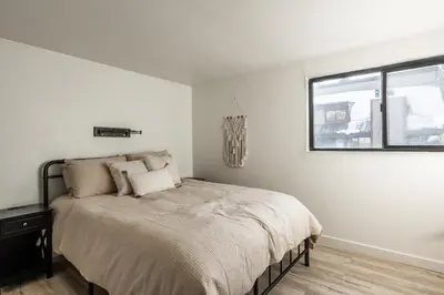 a bedroom with a bed and a window at San Sierra 19 in Mammoth Lakes
