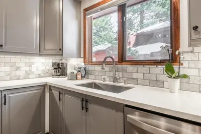 a kitchen with a sink and a window at Winterset 20 in Mammoth Lakes