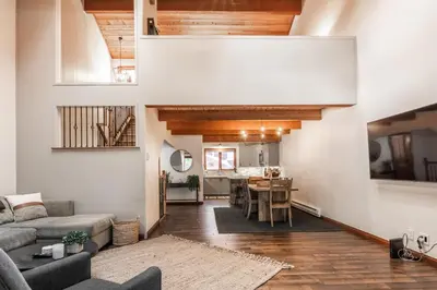 a living room with a couch and a table at Winterset 20 in Mammoth Lakes