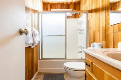 a bathroom with a toilet and a sink at Mammoth View Villas 32 in Mammoth Lakes
