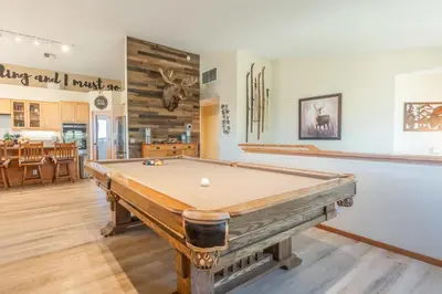 a room with a pool table in it at Snowcreek 821 in Mammoth Lakes
