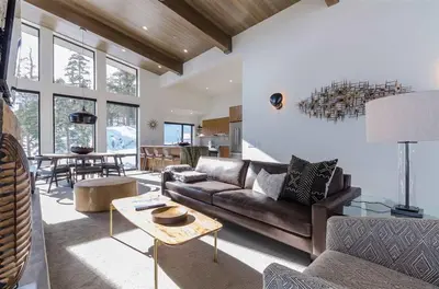 a living room with a couch and a table at 88 Bridges Lane in Mammoth Lakes