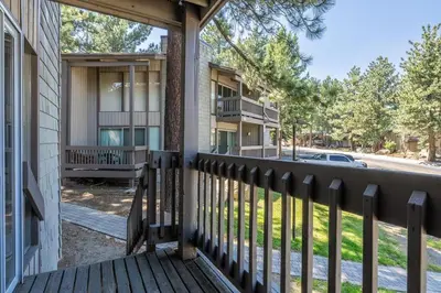 a front porch of a house with a balcony at Sierra Park Villas 45 in Mammoth Lakes