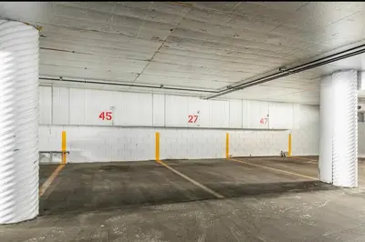 an empty parking garage with the numbers fortysix at Crestview 45 in Mammoth Lakes