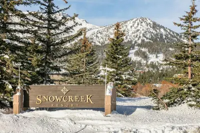 a sign for snow sweepett resort in the snow at Snowcreek 778 in Mammoth Lakes