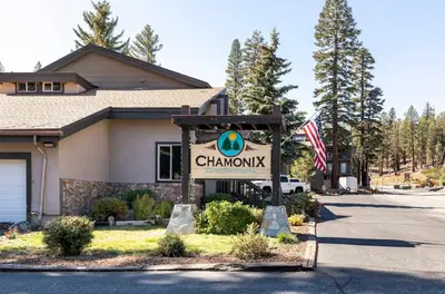a sign for a chamonix sign in front of a building at Chamonix 91 in Mammoth Lakes
