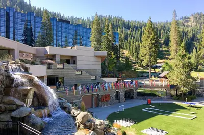 a resort with a waterfall and a water park at Everline Resort & Spa 536 in Olympic Valley