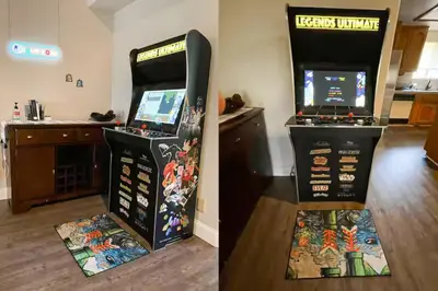 a video game arcade machine next to a game room at Whispering Pines in Oakhurst