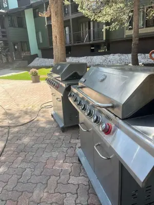 an outdoor grill and stove with a grill at Ski In Canyon Lodge Modern 1 bdrm Pacman and Garage in Mammoth Lakes