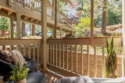 a screened in porch with a window and a chair at Hidden Valley 33 in Mammoth Lakes