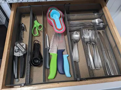 a drawer filled with utensils in a drawer at 719 Mid-Town Retreat in Reno