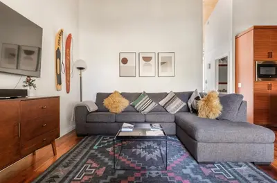 a living room with a couch and a coffee table at Chateau Blanc 21 in Mammoth Lakes