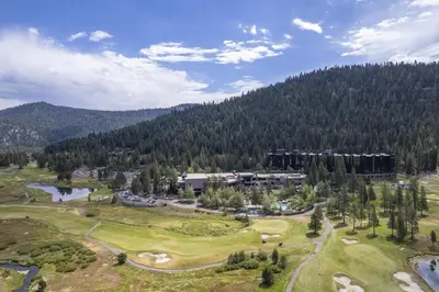 an aerial view of a golf course with a resort at Ski-InandSki-Out! 2BR Condo with Resort Pools, Spa in Olympic Valley