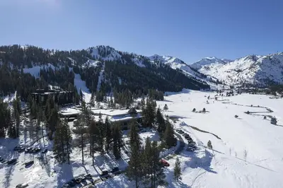 an aerial view of a ski resort in the snow at Walk to Palisades Tahoe Ski Lifts Mtn-View Condo in Olympic Valley