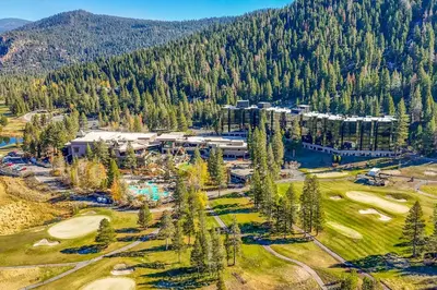 an aerial view of a golf course with a resort at Ski-InandSki-Out! 2BR Resort Condo with Pool, Hot Tub in Olympic Valley