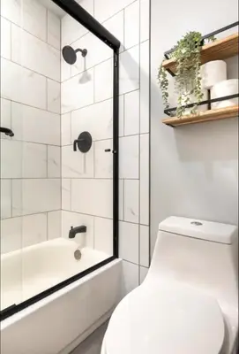 a bathroom with a white toilet and a shower at Snowcreek 1 in Mammoth Lakes