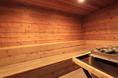 a sauna with a bench and a table in it at Snowcreek 1 in Mammoth Lakes