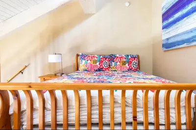 a bedroom with a wooden bed with a wooden crib at Western Slopes Villas 18 in Mammoth Lakes
