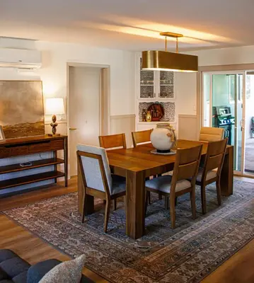 a dining room with a wooden table and chairs at Quiet retreat - Hot tub & sauna in Three Rivers in Three Rivers