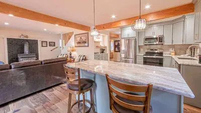 a kitchen with a large counter top in a room at Whispering Pines Cabin For 6 in Carnelian Bay