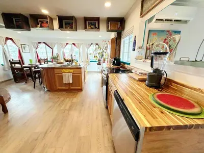 a kitchen with a counter with a watermelon on it at Hot Tub, Farm Chic Shingle Springs Birders Heaven in Shingle Springs