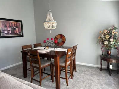 a dining room with a table and chairs at The gorgeous in Citrus Heights