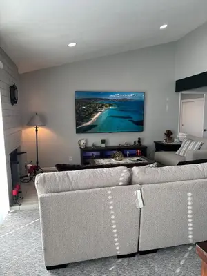 a living room with a couch and a flat screen tv at The gorgeous in Citrus Heights