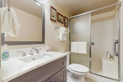 a bathroom with a toilet and a sink and a shower at Tahoe Summit Escape in Incline Village