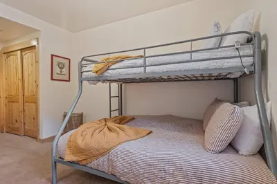 a bedroom with two bunk beds in a room at Mountain Retreat - Sleeps 7 - Canoe - Fireplace in Soda Springs