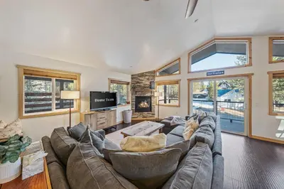 a large living room with a couch and a tv at Mountain Retreat - Sleeps 7 - Canoe - Fireplace in Soda Springs