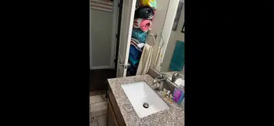 a bathroom with a sink and a mirror at 35th Avenue room for rent in Sacramento