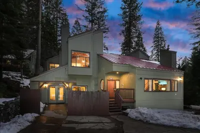 a house at night with the lights on at Yosemite Spirit in White Wolf