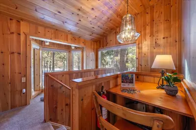 a home office with a wooden desk in a cabin at Midiron Golf Cabin cabin in Tahoe Vista