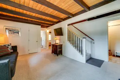 a living room with a couch and a wooden ceiling at Walk to Lake Tahoe Family Retreat with Deck! in Incline Village