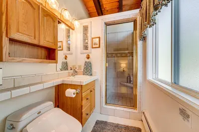 a bathroom with a toilet and a sink and a shower at Walk to Lake Tahoe Family Retreat with Deck! in Incline Village