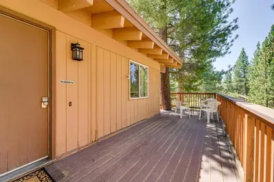 a large deck with chairs and a table on it at Walk to Lake Tahoe Family Retreat with Deck! in Incline Village