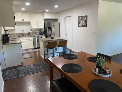 a kitchen and dining room with a table and chairs at Kipps Hill Haven A - Folsom Lake Escape in El Dorado Hills