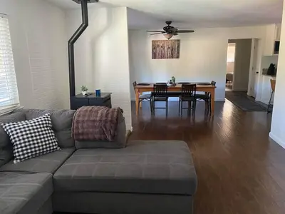 a living room with a couch and a dining room table at Kipps Hill Haven A - Folsom Lake Escape in El Dorado Hills