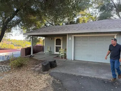 a man standing in front of a garage at Kipps Hill Haven A - Folsom Lake Escape in El Dorado Hills