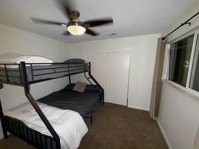 a bedroom with two bunk beds and a ceiling fan at Kipps Hill Haven B — Folsom Lake Escape in El Dorado Hills
