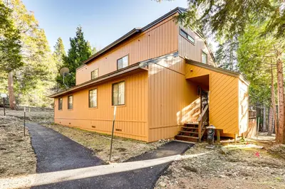 a house being built with a garage at Community Perks and Watercrafts Shaver Lake Condo in Shaver Lake