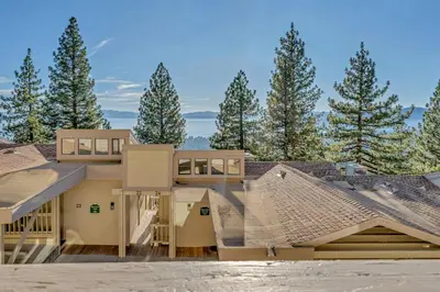 a view of a house with trees in the background at Incline Village Views - Pellet Stove Deck in Incline Village