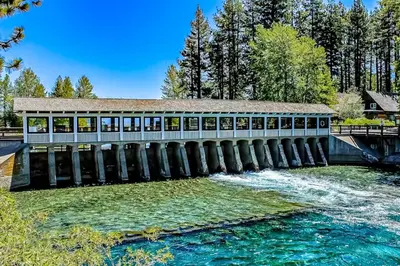 a bridge over a river with a building at Spectacular Lake Views in Tahoe City